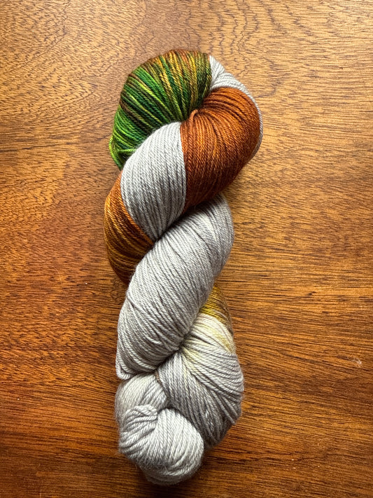 Tweede Kansje 014 - Deluxe Merino Sock Assigned Pooling ‘Pumpkin Patch’