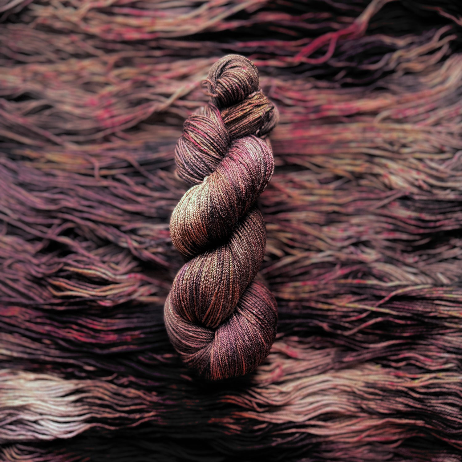 Christmas Pudding hand-dyed Deluxe Merino Sock yarn skein by Auridon Yarns