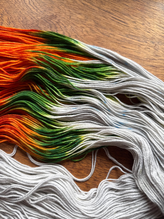 Tweede Kansje 015 - Deluxe Merino Sock Assigned Pooling ‘Pumpkin Patch’