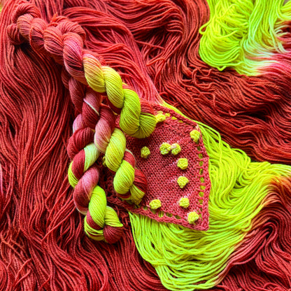 Three mini skeins of Roland Garros hand-dyed assigned pooling yarn by Auridon Yarns