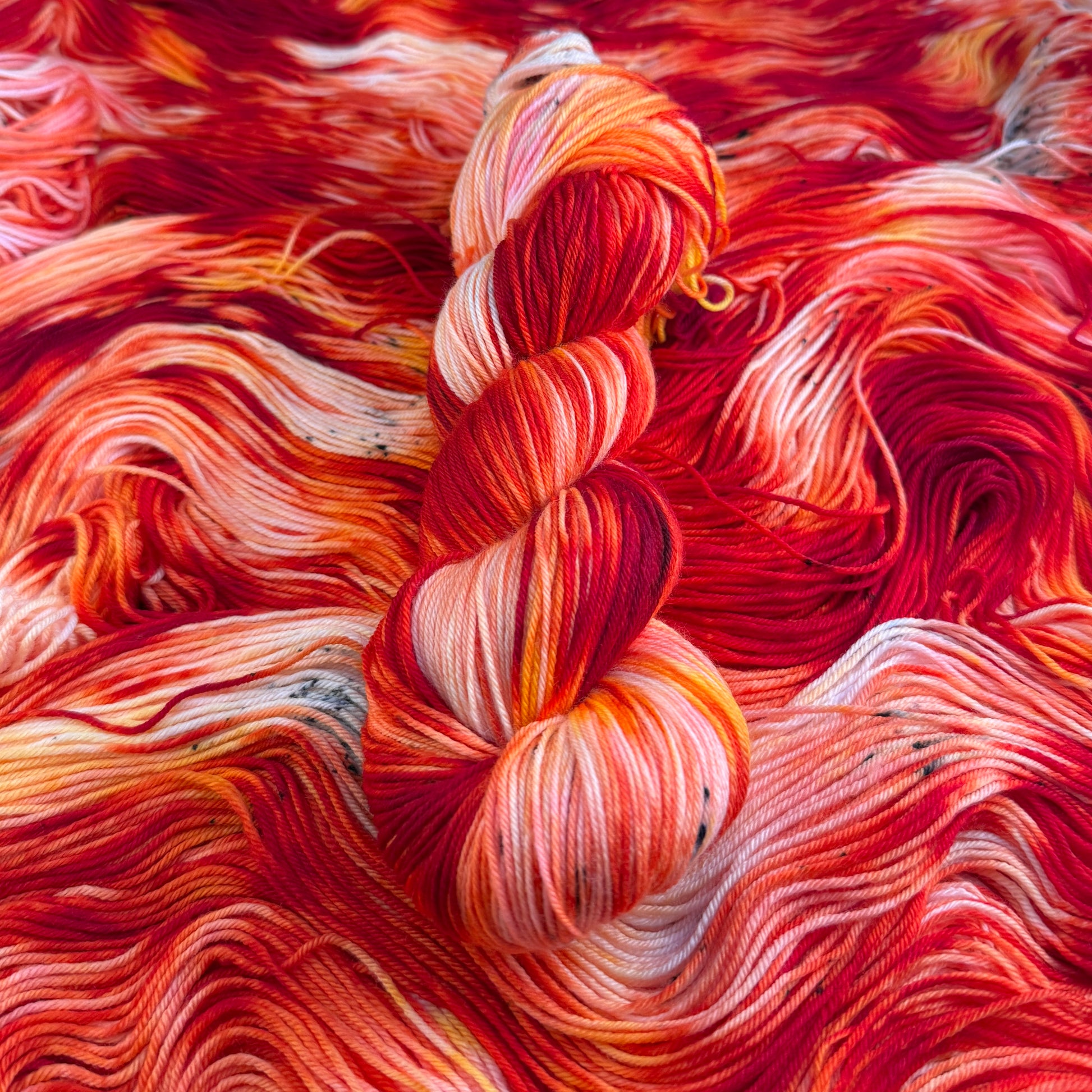 Baroque Inferno hand-dyed Deluxe Merino Sock yarn skein by Auridon Yarns